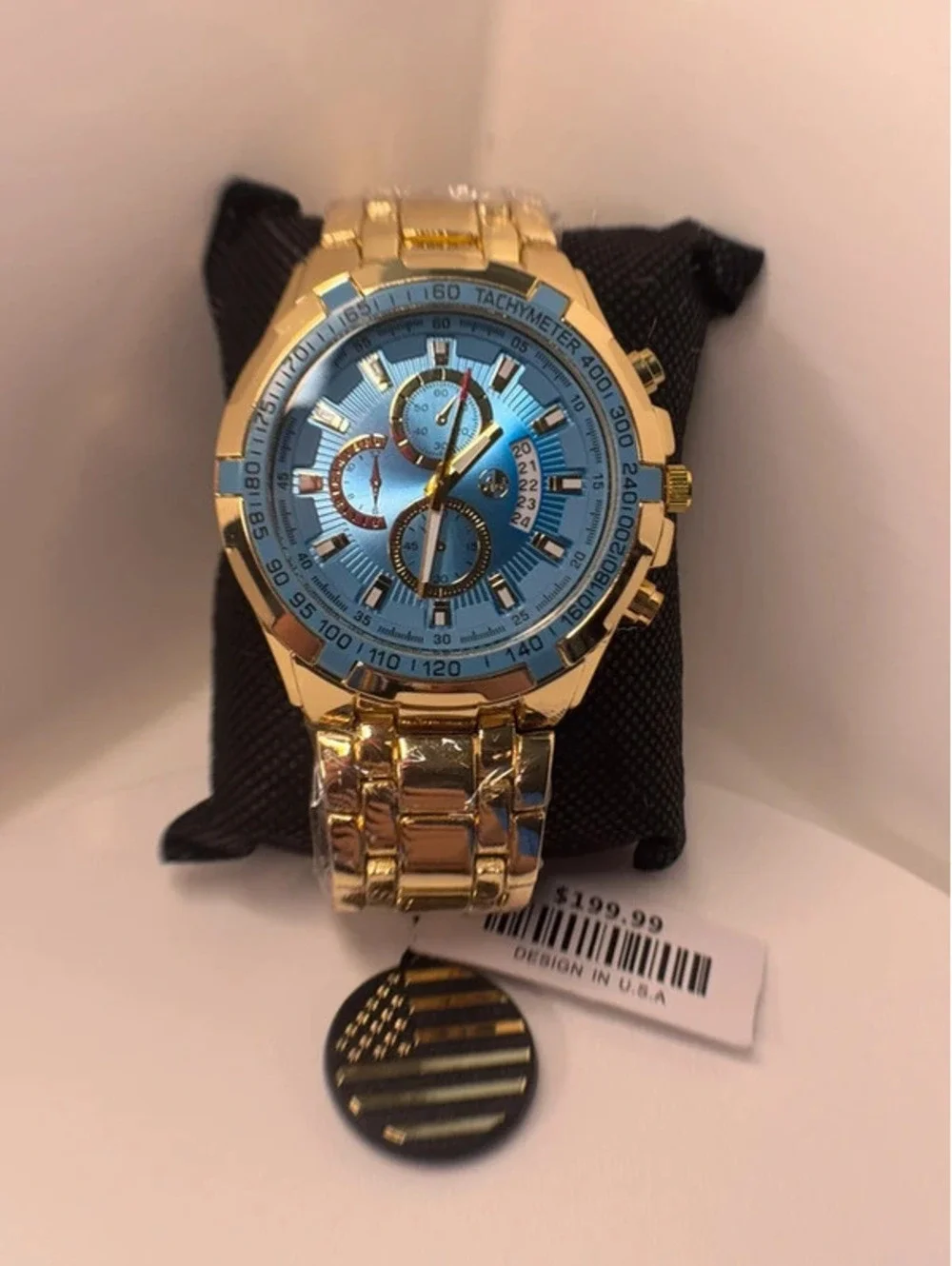 AJ heavy stainless steel, gold tone, blue face Sports Master